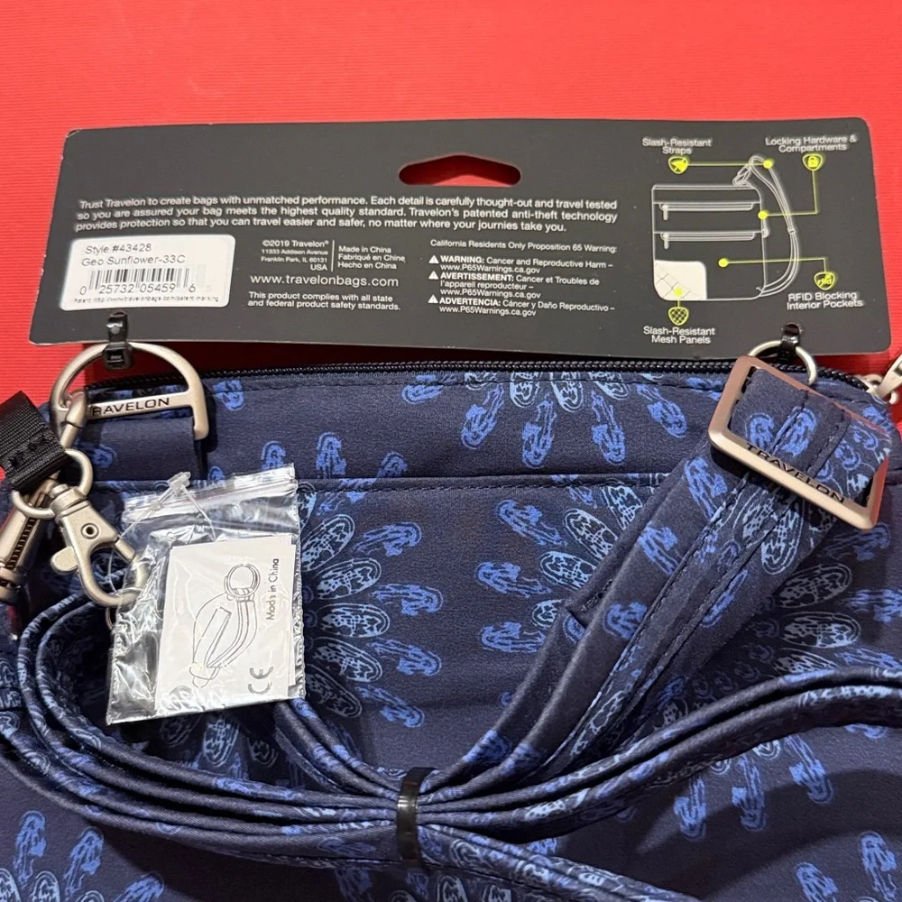 Travelon Navy and Blue Geo Sun Flower Crossbody Bag - Picture 9 of 12